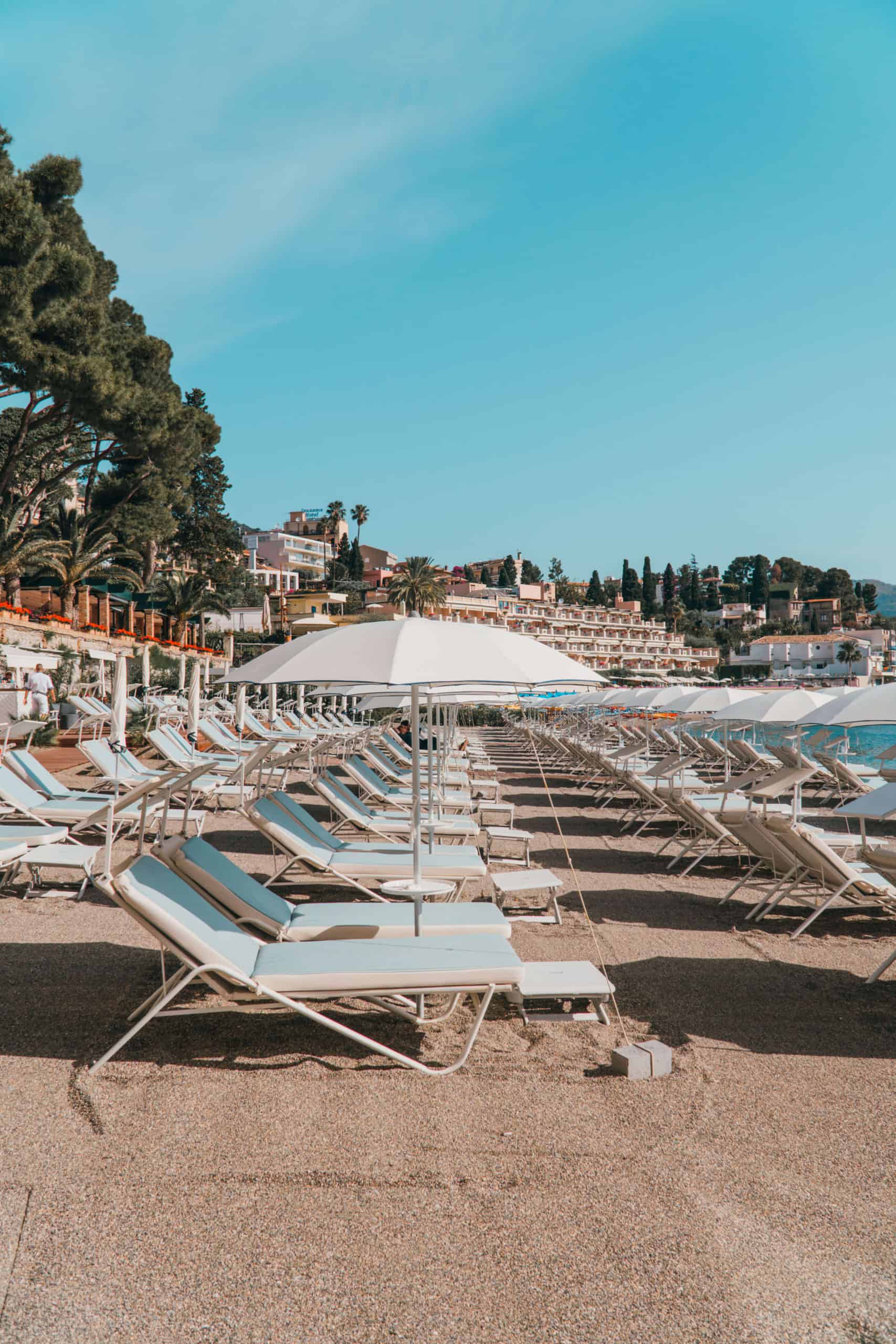 Private beach at Belmond Villa Sant'Andrea | Staying at the Belmond Hotel Grand Timeo Vs. Belmond Villa Sant’Andrea | The Republic of Rose