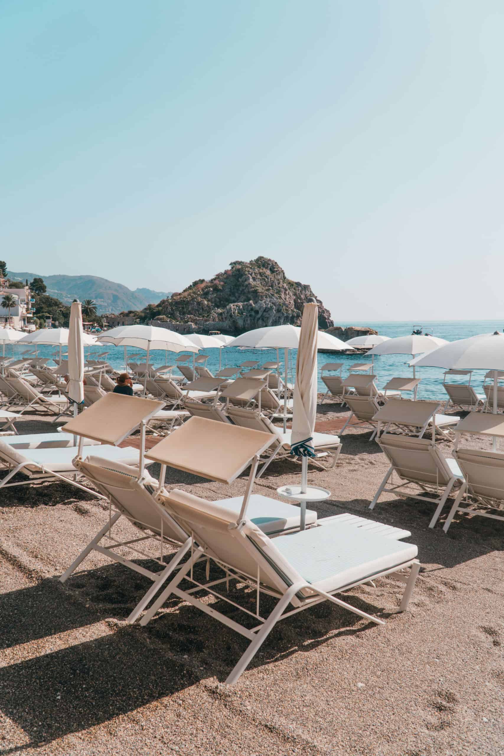 Private beach at Belmond Villa Sant'Andrea | Staying at the Belmond Hotel Grand Timeo Vs. Belmond Villa Sant’Andrea | The Republic of Rose