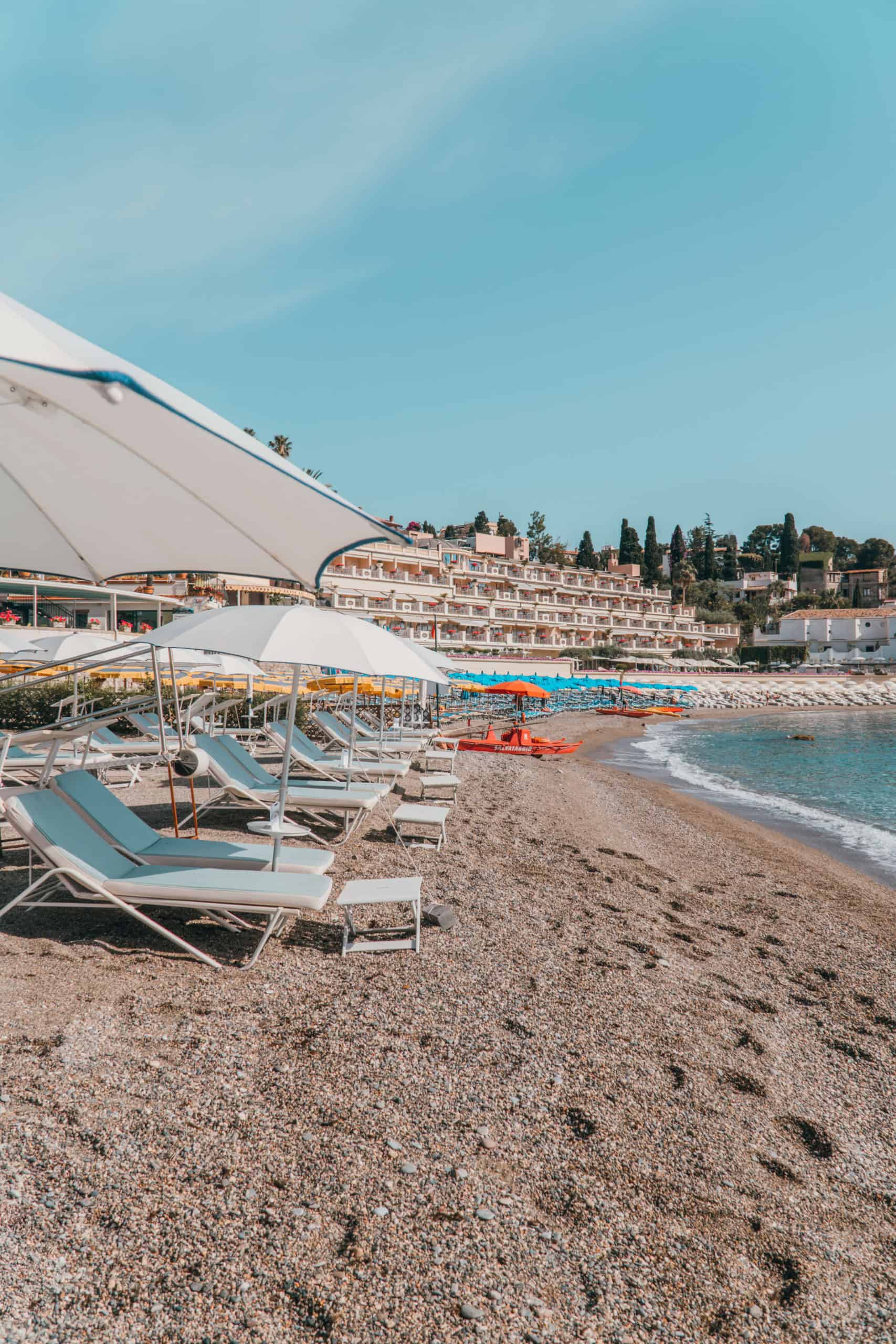 Private beach at Belmond Villa Sant'Andrea | Staying at the Belmond Hotel Grand Timeo Vs. Belmond Villa Sant’Andrea | The Republic of Rose