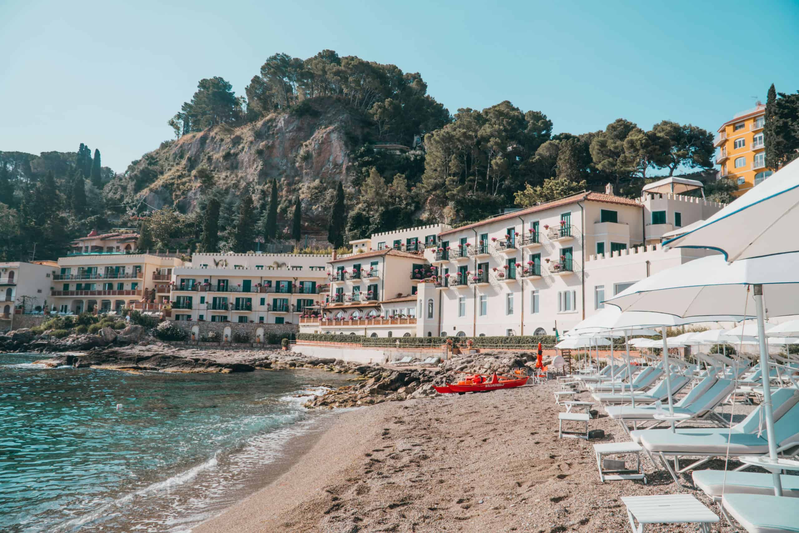 Private beach at Belmond Villa Sant'Andrea | Staying at the Belmond Hotel Grand Timeo Vs. Belmond Villa Sant’Andrea | The Republic of Rose