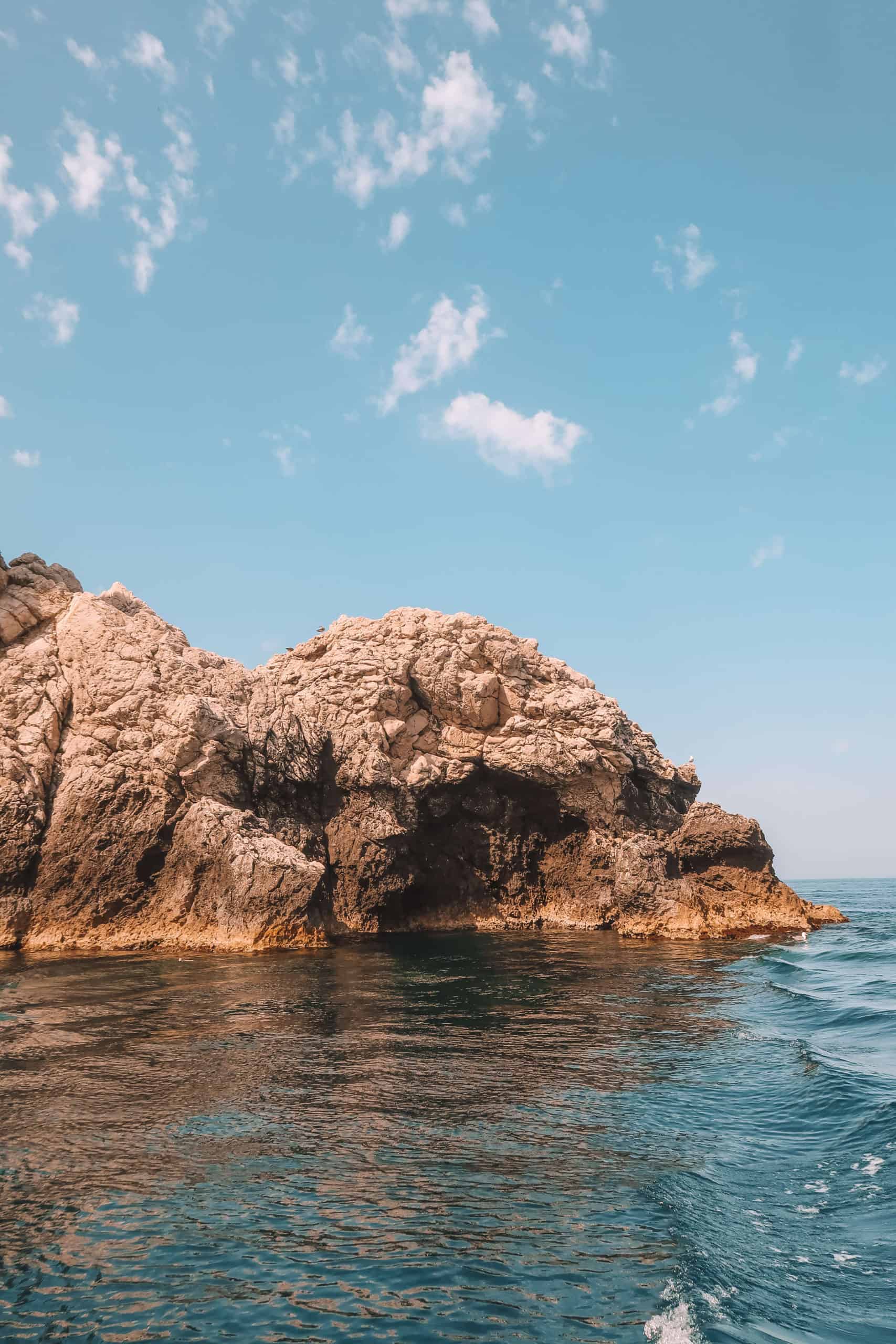 Taormina coastline on the boat experience | Staying at the Belmond Hotel Grand Timeo Vs. Belmond Villa Sant’Andrea | The Republic of Rose