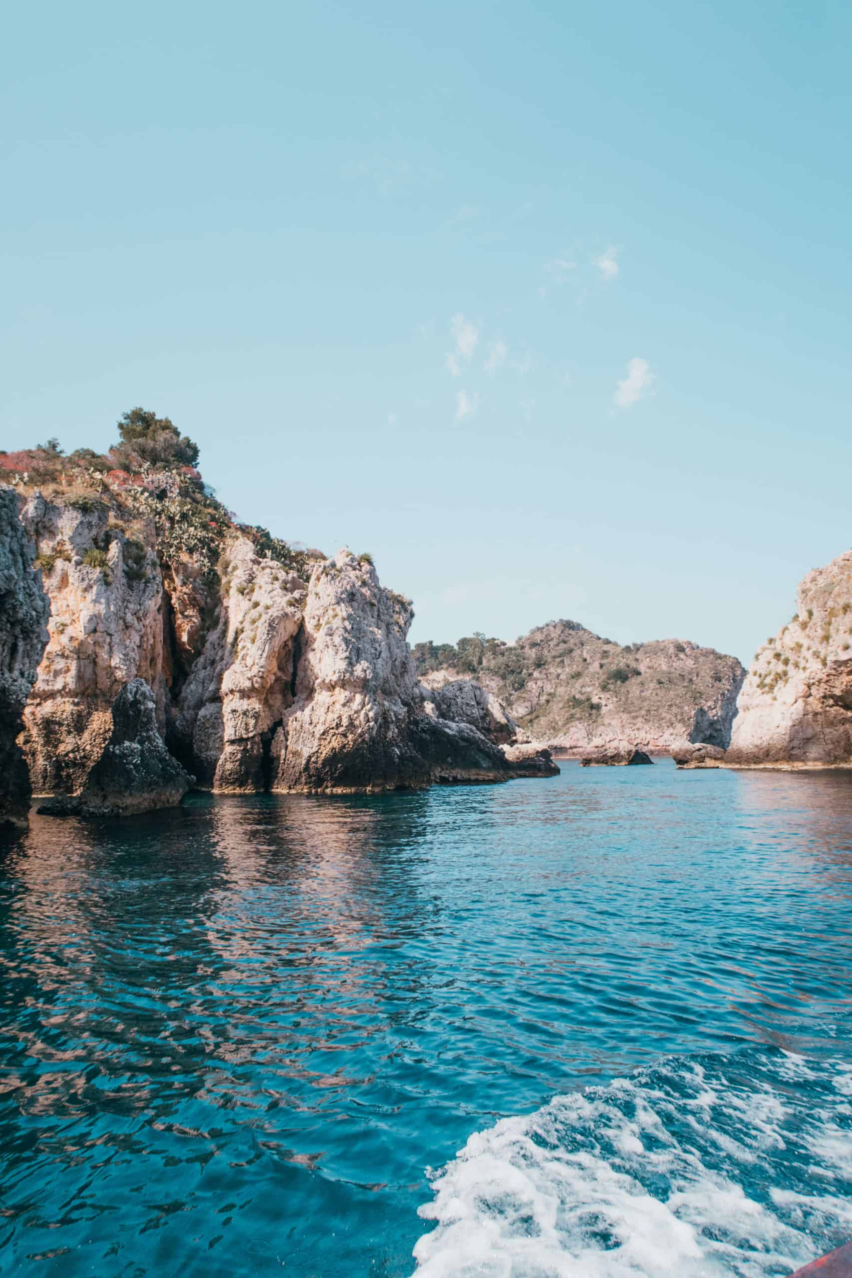 Taormina coastline on the boat experience | Staying at the Belmond Hotel Grand Timeo Vs. Belmond Villa Sant’Andrea | The Republic of Rose