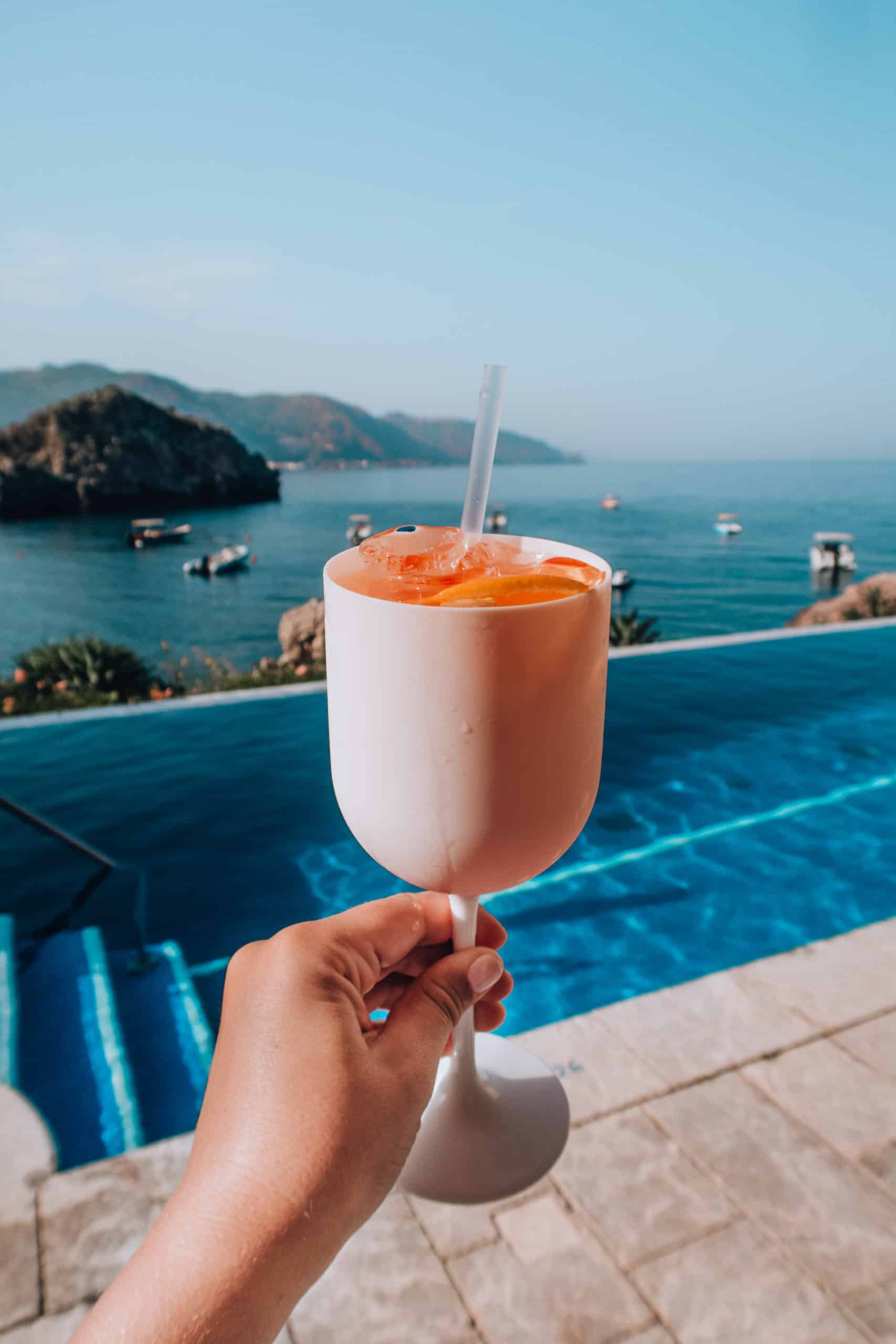 Aperol Spritz by the pool at Belmond Villa Sant'Andrea | Staying at the Belmond Hotel Grand Timeo Vs. Belmond Villa Sant’Andrea | The Republic of Rose